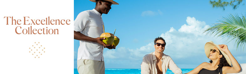 Couple enjoying drinks, Excellence Resorts