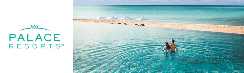 Couple in Palace Resorts infinity pool