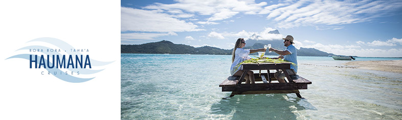 Couple dining in shallow Tahiti waters