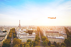 Plane flying over Paris, France