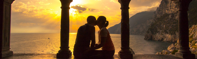 Romantic Getaways - Couple kissing, Italy